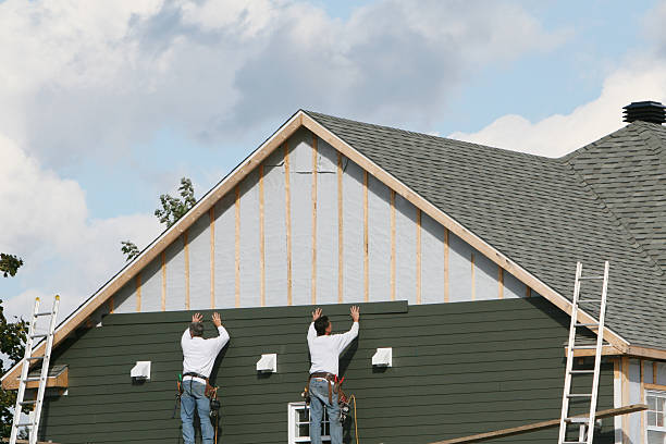 Professional Siding Contractor technician working in Old Bethpage, NY